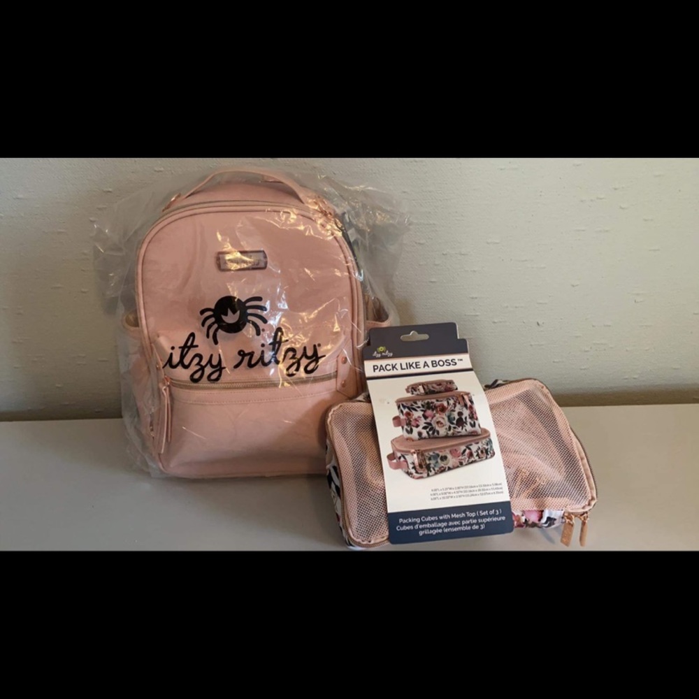 Brand new still in package Itzy Ritzy mini blush and floral packing cubes